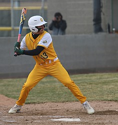The Quincy Jacks’ Jace Reyes (13) steps up to bat against Cashmere earlier this season.