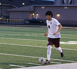 Aiden Miramontes-Ramirez (8) pushes the ball upfield against the Royal Knights earlier this season. The Wahluke Warriors defeated the Zillah Leopards 8-0 on the road Monday.