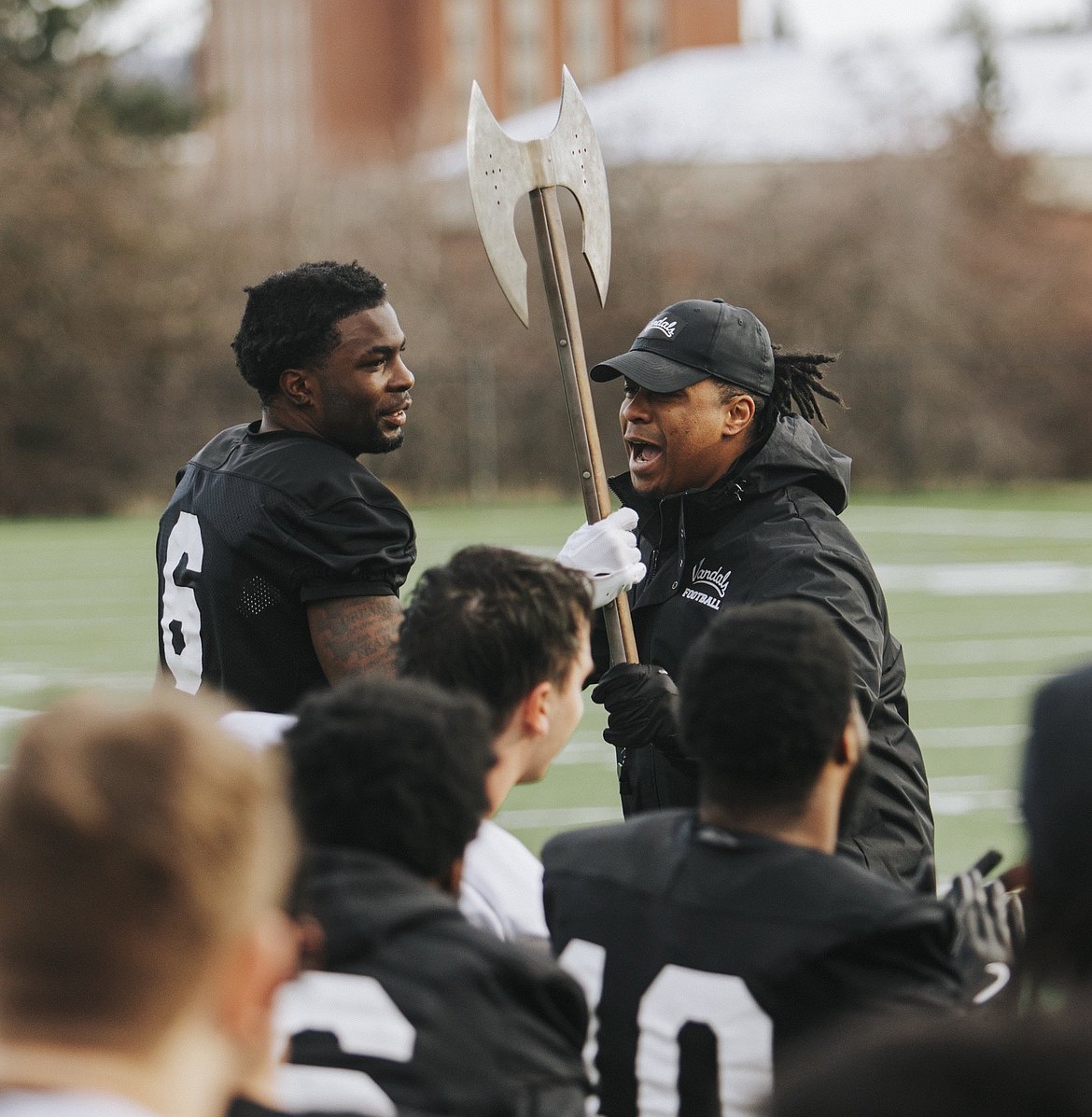 IDAHO ATHLETICS
Idaho football coach Thomas Ford Jr. awards the battle axe to graduate student defensive back Tyrane Stewart after the Vandals' first spring football practice Tuesday morning in Moscow.