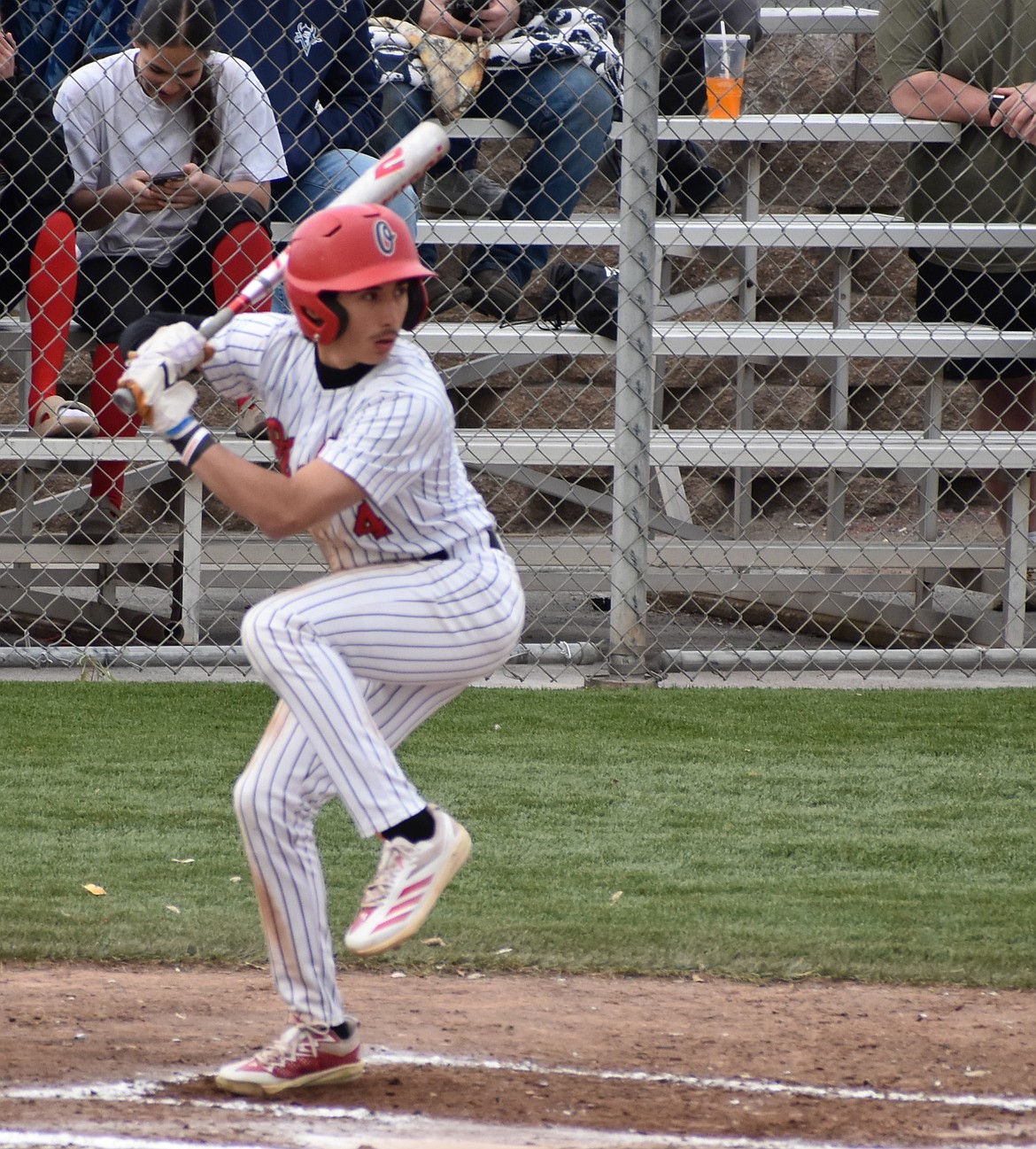 Othello’s Noah Ozuna steps up to bat and prepares to swing at a pitch during Tuesday’s game against Prosser.
