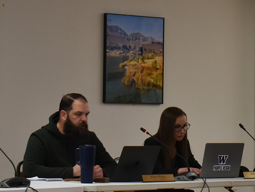 Several resolutions were passed during the Wednesday council meeting, which limited the mayor’s authority and sought to protect public records and finances. Soap Lake Mayor Peter Sharp, left, will no longer have access to city bank accounts or credit cards after one measure was passed. City Attorney Julie Norton sits to the right.