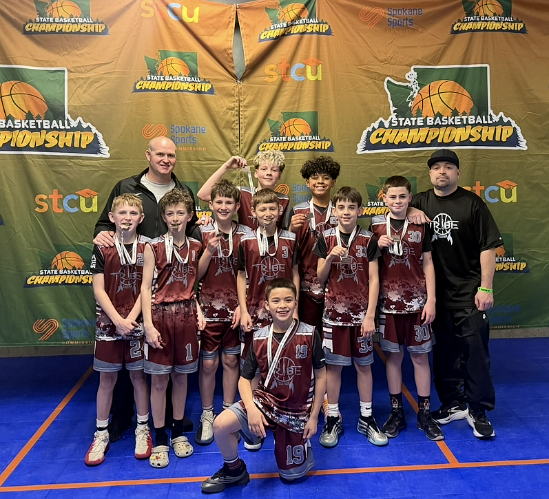 The Moses Lake fifth-grade Tribe team stands together with their third-place medals following the state tournament. Back row, Coach Matt Ahmann, Declan Huberdeau and Luca Sirek. Middle row, Cohen Phelps, Kai Bruce, Gannon Janet, Levi Gordillo, Mason Martinez, Zach Ahmann and Assistant Coach Josh Gordilla. Front row, Madden Savala.