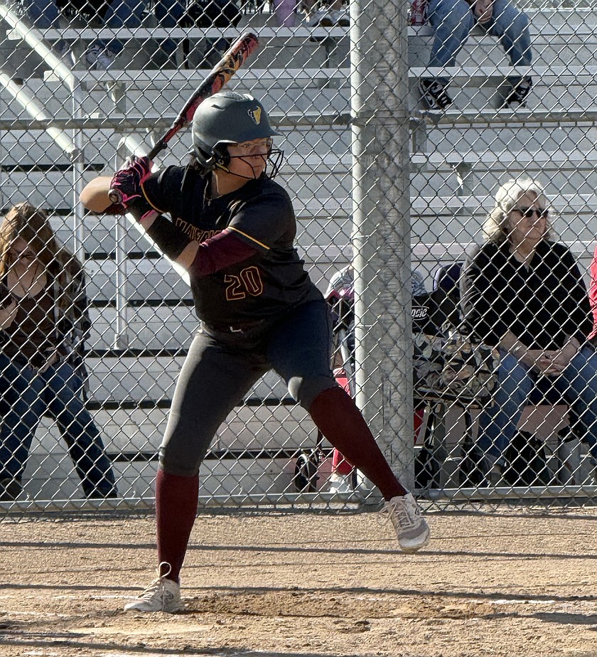 The Mavericks’ Alina Lopez (20) steps into her swing while at bat. Moses Lake defeated Eisenhower 19-0 and 25-5 in a doubleheader Friday.
