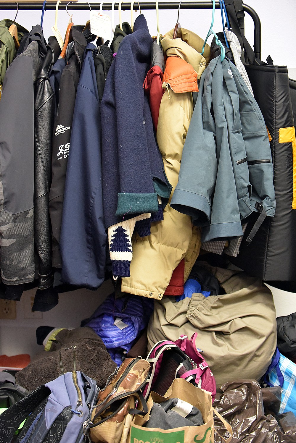 Jackets await careful repairs at Super Bloom Gear Repair. (Julie Engler/Whitefish Pilot)