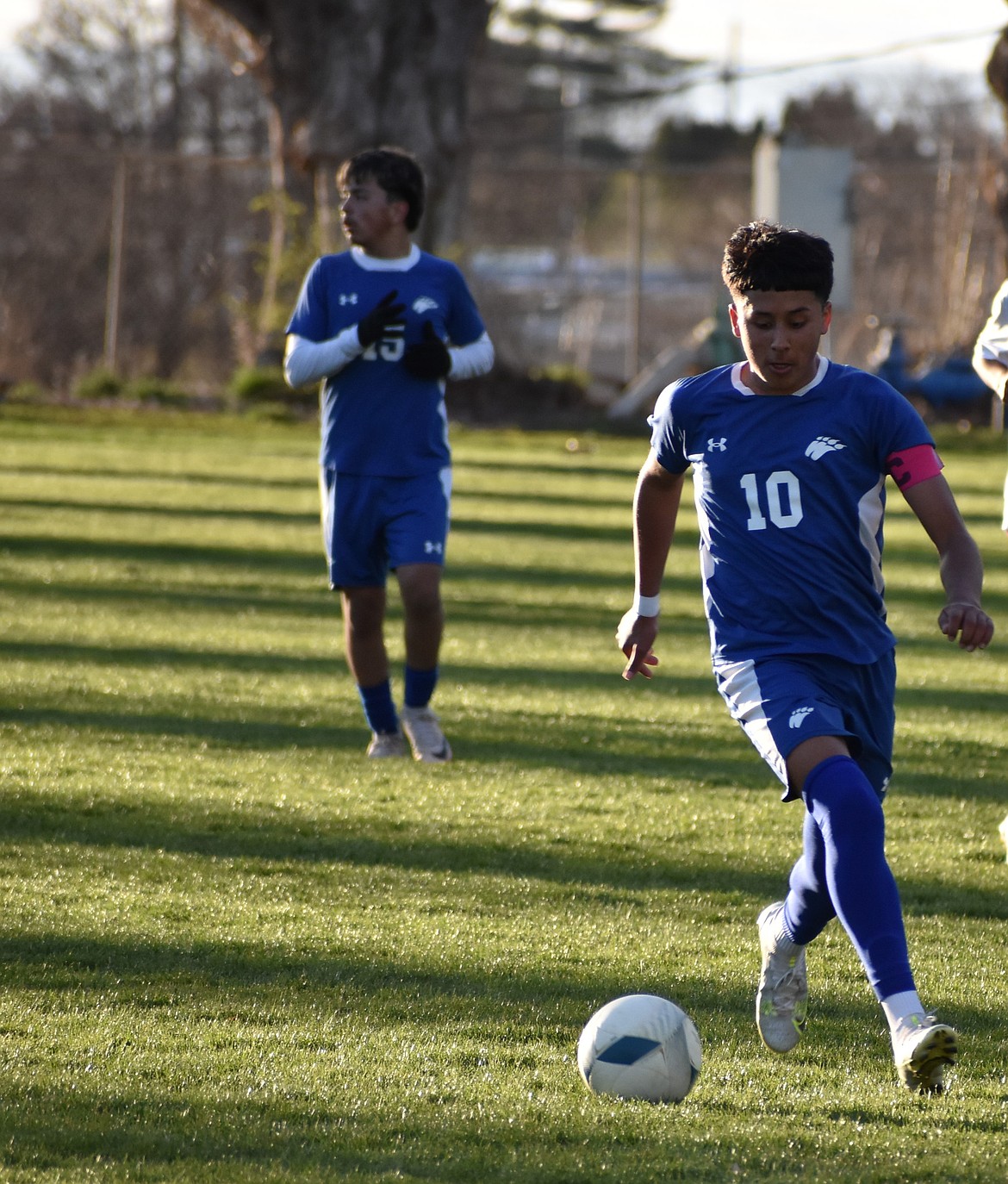 Jose Perez (10) chases down the ball against the Wahluke Warriors.