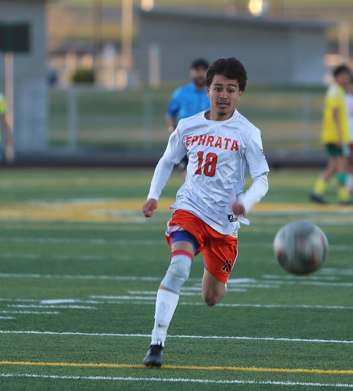 Ephrata senior Jason Aleman chases the ball across the field during Tuesday’s game against Quincy.