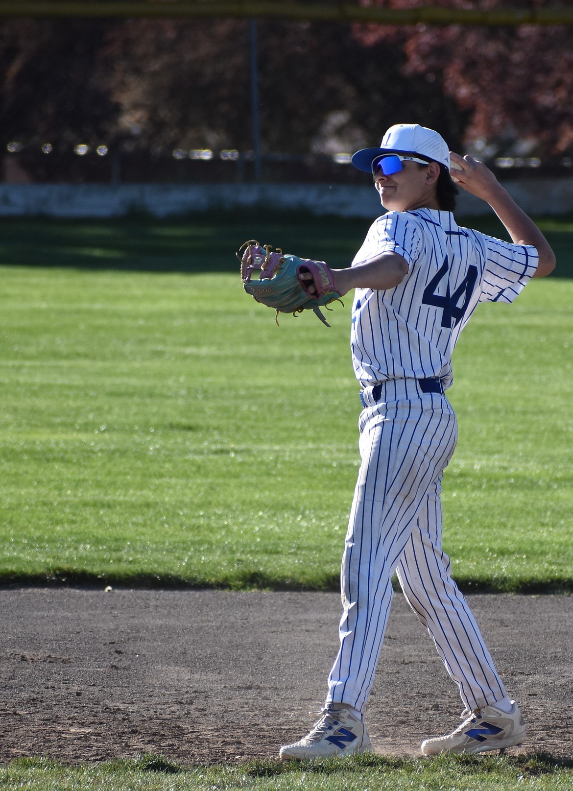 Bennett Leavitt from the Cougars throws the ball back towards Kameron Jensen, who was pitching later in the game against Lake Roosevelt.