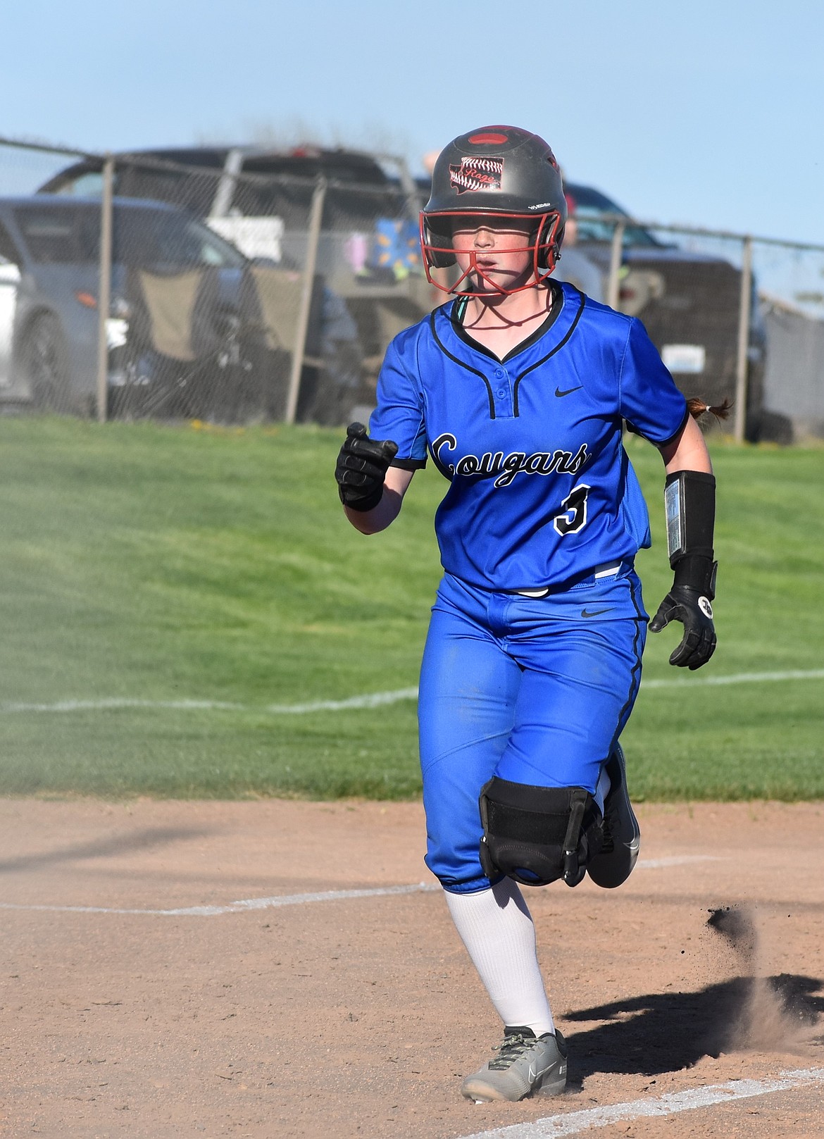 Warden’s Allie Jensen rushes to home plate to score a run in the final inning of Thursday’s game against Lake Roosevelt.