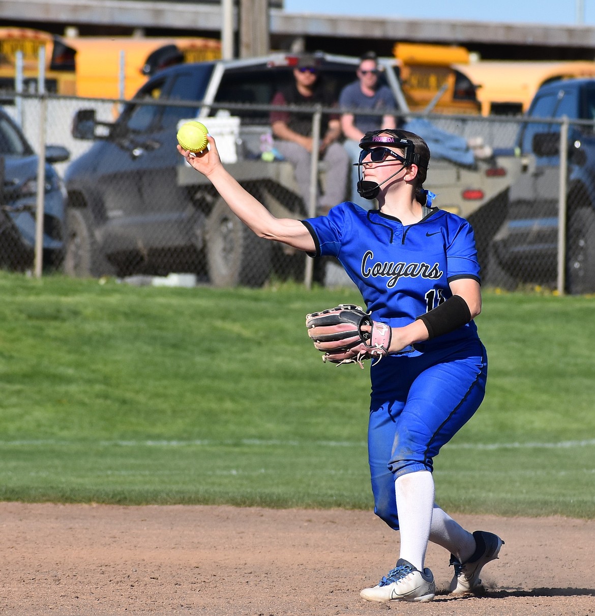 Ariana Pruneda from the Cougars throws the ball to first base for an out against Lake Roosevelt Thursday afternoon.