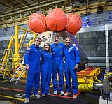 Artemis II's moon-traveling astronauts return home to cheers after a record-breaking trip