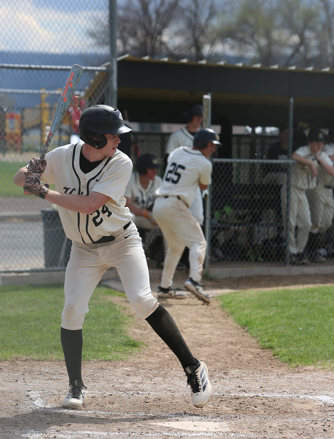 The Knights’ Bryan Larsen (24) eyes the pitcher as he gets set to hit against the ACH Warriors Saturday.