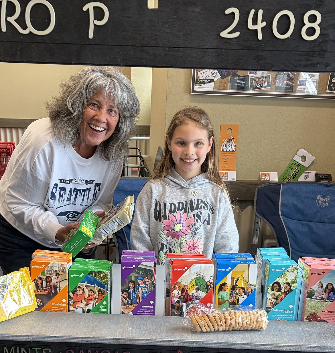 Kerri Thoreson with Girl Scout Aria Hutchison in Seright’s ACE Hardware on Saturday in Post Falls.
