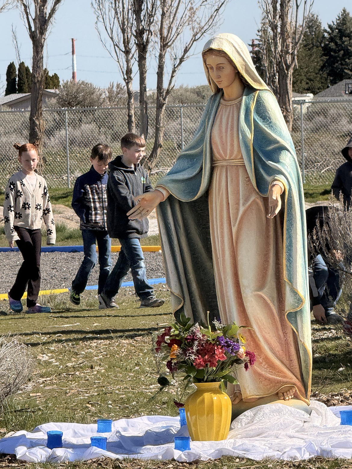 The statue of the Virgin Mary, donated by a family from St. Rose of Lima Parish, was blessed by Pope St. John Paul II before his death in 2005. The statue is one of the things required to qualify the prayer garden as a space for Catholic weddings.