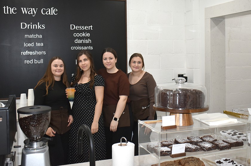 From left: Dianna, Tatyana (holding a Midnight Sky), Alesia and Alina Pashkovsky behind the counter at The Way Cafe, which opened Tuesday in downtown Moses Lake.