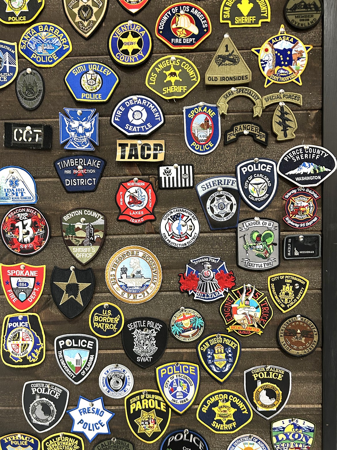 Patches of first responders are displayed at Best Life Coeur d'Alene.