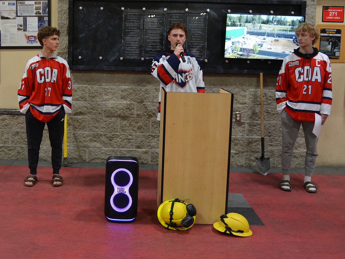 Gunnar Podollan, Tyler Karchut and Kade Ziemendorf of CDA Hockey Academy Youth Council address the audience about how the second rink will benefit local hockey at the Frontier Ice Rink.