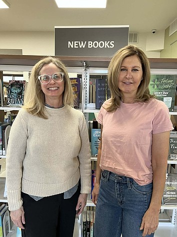 NCW Libraries Executive Director Barbara Walters, left, with Grant County Commissioner Cindy Carter, right at the new Royal City library. Next week is National Library Week.