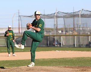Quincy’s pitcher Ashton Barnes-Keller gets ready to pitch to an Othello batter during last week’s matchup.