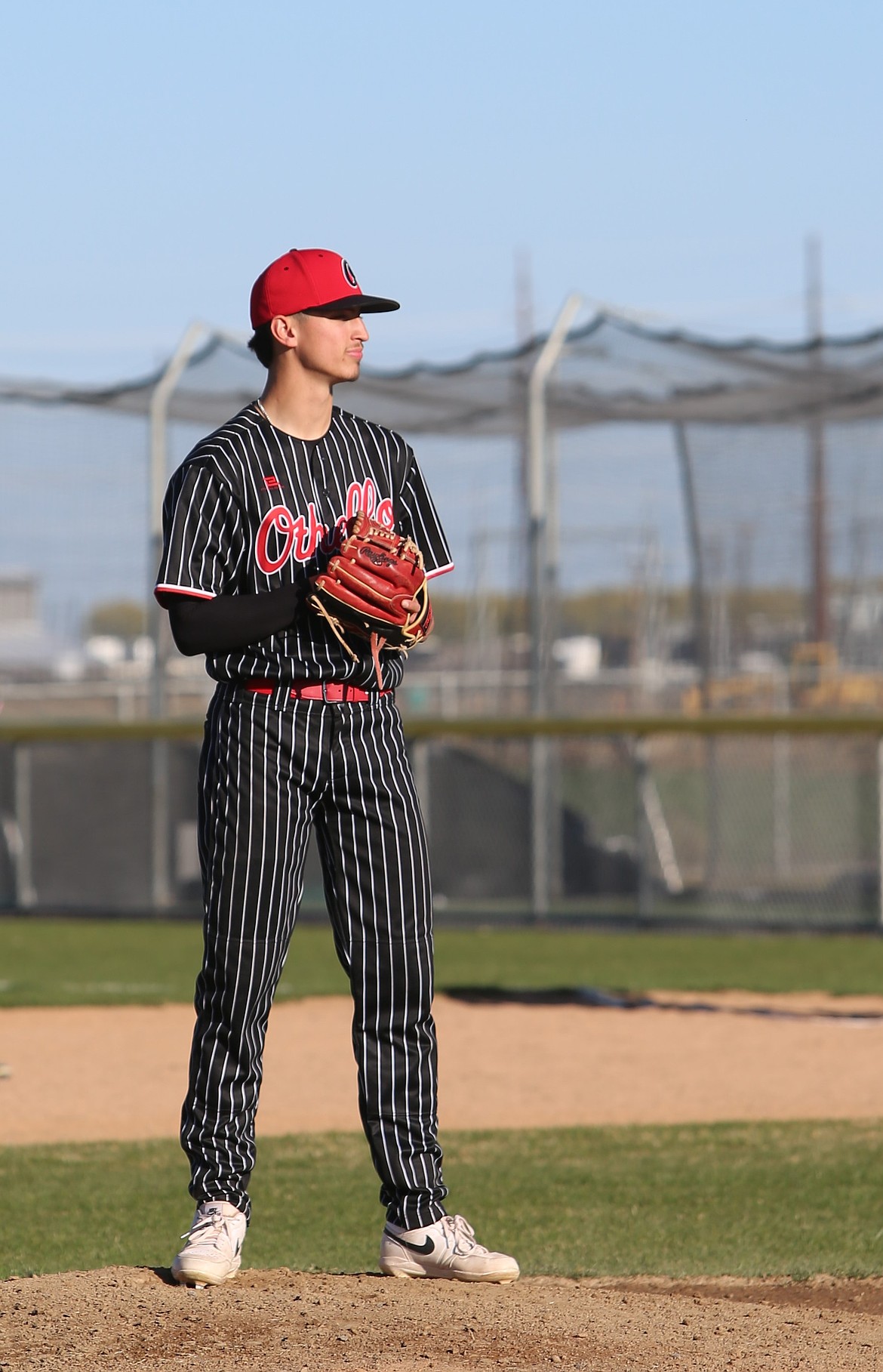 Huskies senior Quade Gonzalez on the mound ready to pitch during last week’s game against the Jacks.