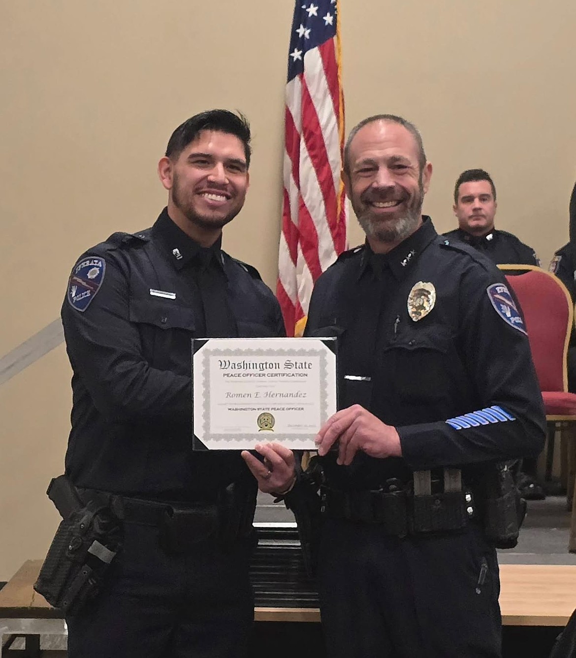 Officer Romen Hernandez, left, graduated from the Washington State Criminal Justice Training Commission Basin Law Enforcement Academy in December. Ephrata Police Department Chief Erik Koch attended his ceremony.