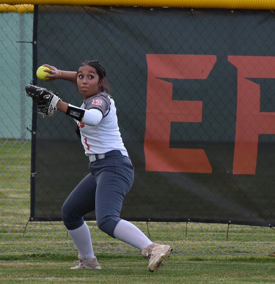 Tigers player Cami Martinez throws the ball back toward the diamond during a prior home game this season.
