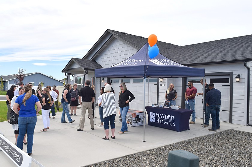 Hayden Homes hosts a ribbon-cutting and open house at the model home at the Polo Ridge development in Moses Lake. Hayden recently received Great Place to Work certification for the third year in a row.