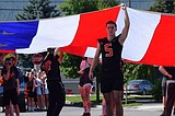Post Falls vows to save parade