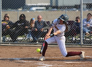 The Mavericks’ Amilia Borchert (16) drills the ball while at bat. The Moses Lake Mavericks swept the Wenatchee Panthers 11-5 and 10-3 in a doubleheader Friday.
