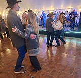 Polson Fairgrounds supporters kick up heels at Cowboy Ball