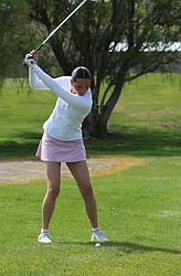 The Mavericks’ Lilliana Roylance takes her next swing during a match at Moses Lake Golf Course Wednesday.