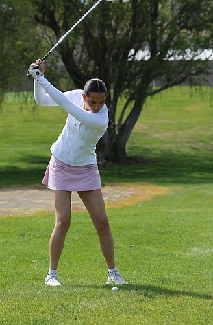 The Mavericks’ Lilliana Roylance takes her next swing during a match at Moses Lake Golf Course Wednesday.