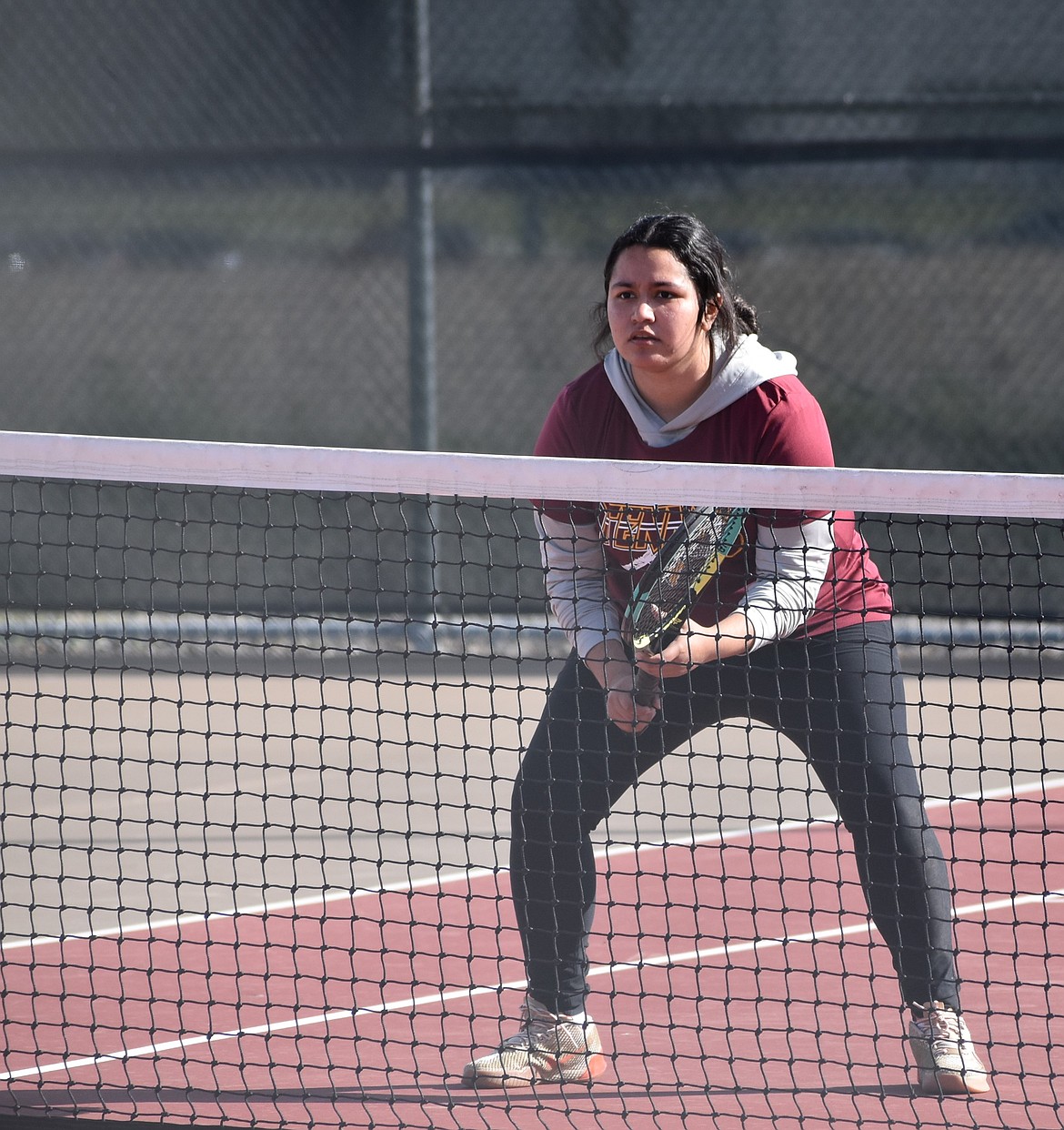 Mavs player Camila Gonzalez steps up to the net as she awaits the serve during a previous doubles match this season.
