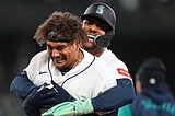 Josh Naylor hits walk-off single and Cal Raleigh homers as Mariners beat A's 5-4 to avoid sweep