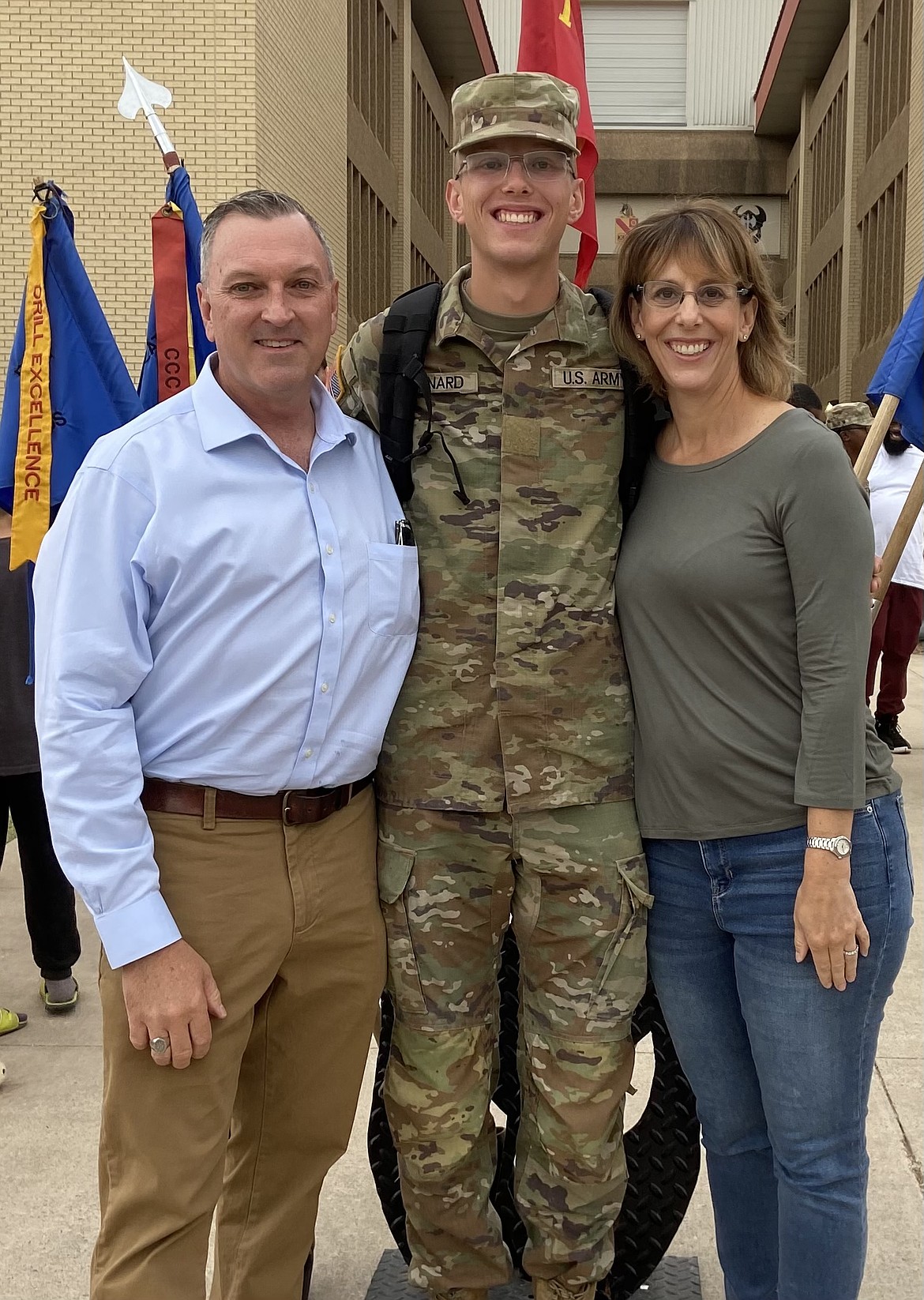 Caden Leonard with his parents Terry Leonard (left) and Sandy Johnston (right) at basic training for the Utah Army National Guard. (Courtesy Caden Leonard)