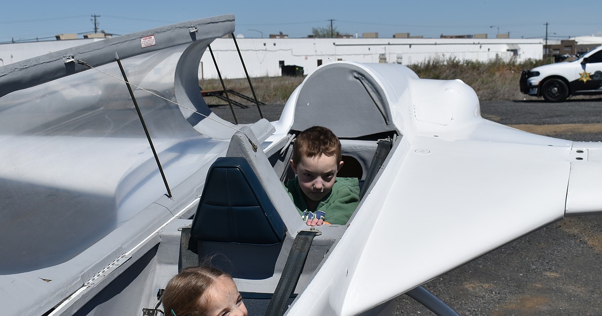 Children climb, dig and explore at MomCo Touch a Truck
