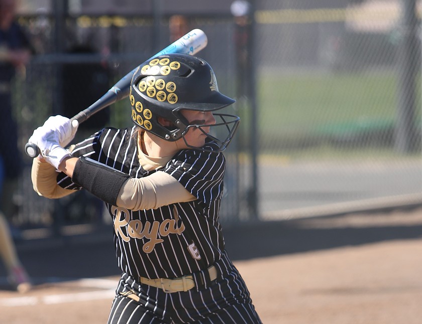 The Knights’ Jill Allred (6) eyes the pitcher before taking a swing earlier this season. The Royal Knights suffered losses to Lynden Christian and Cedar Park Christian Saturday.