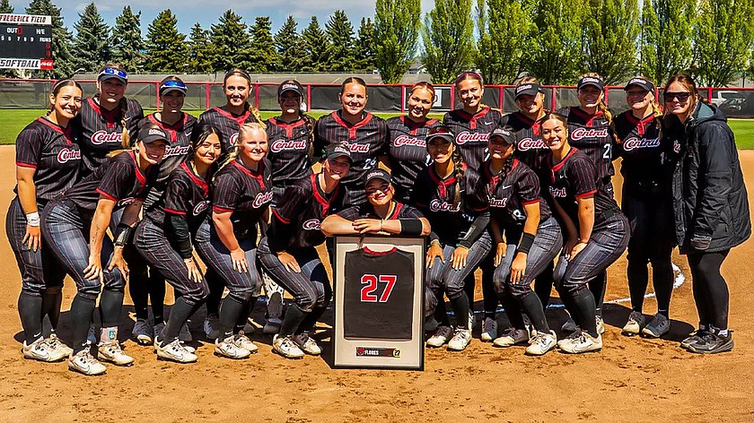 The Central Washington Wildcats softball team gathers for team photo after their last home series of the regular season. The Wildcats swept Montana State University-Billings in their final home games of the season.