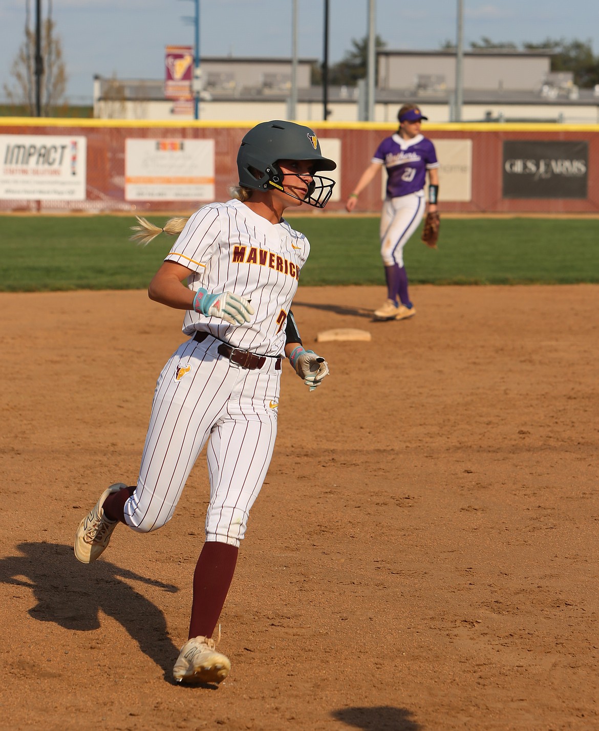 Lila Johnson (7) rounds third base during the Mavericks game against Wenatchee. Johnson scored a run in their win over Cheney on the road Monday.