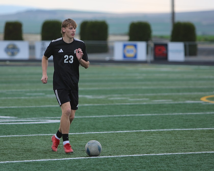The Knights’ Shea Stevenson (23) brings the ball up the field as Royal puts the attack on Zillah earlier this season.
