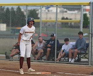 A fired up Addi Reffet (21), who returned Friday from a previously suffered broken lower fibula, yells back to the dugout after a big play against West Valley. The Mavericks split a doubleheader with the Rams Friday.