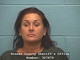 Woman charged in connection to fatal Saturday crash