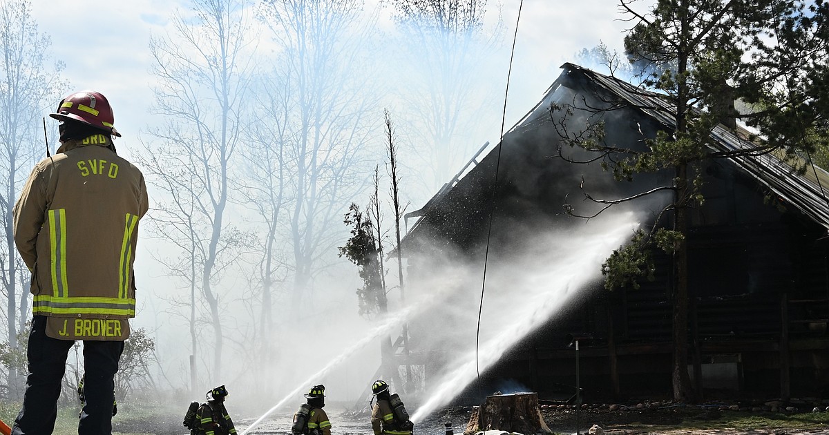 Dozens of firefighters respond to house fire in Evergreen