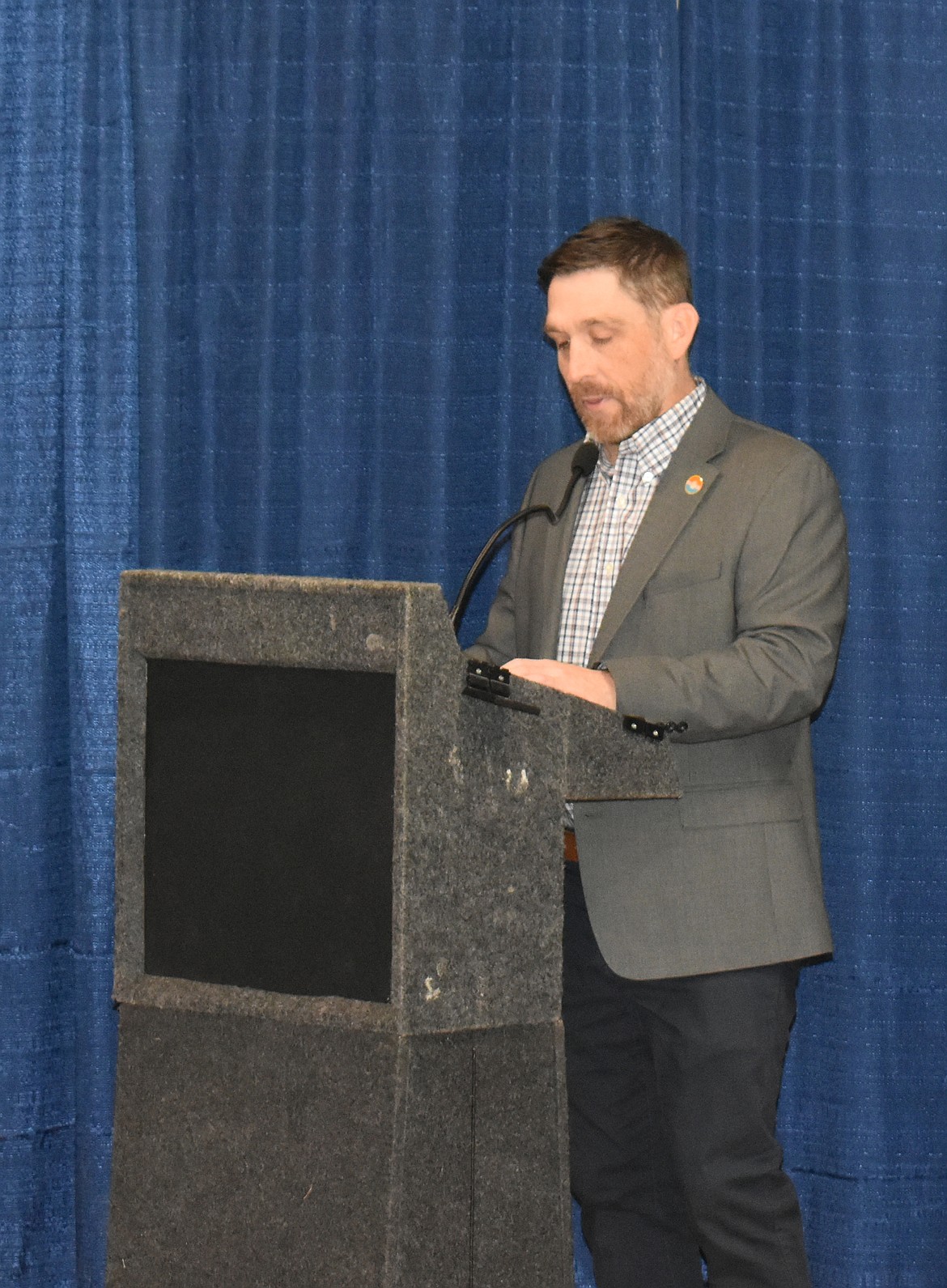 Moses Lake Mayor Dustin Swartz reads from the Book of Jeremiah at the Mayor’s Prayer Breakfast Thursday morning.
