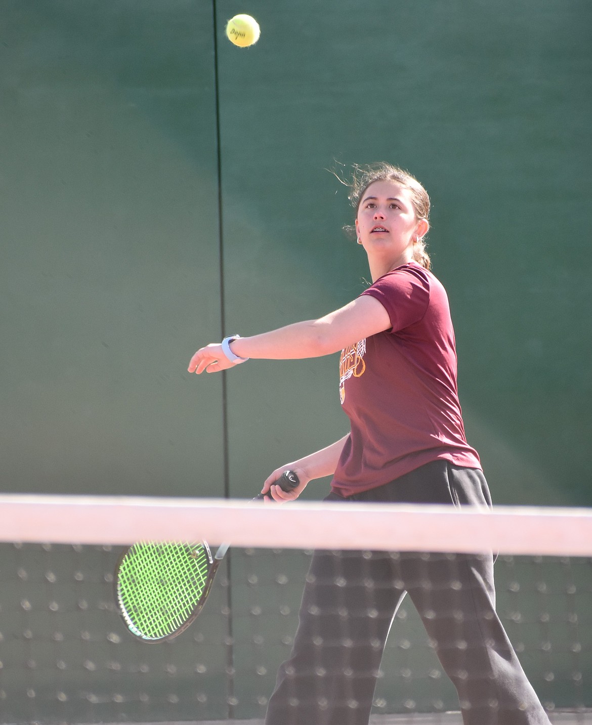 Mavs player Kamaile Bruce readies for the serve during a previous match this season. Bruce will be playing in girls singles at the district tournament.