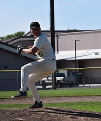 Ernie Weeks from the Knights gears up to throw a pitch during Thursday’s game against Connell.