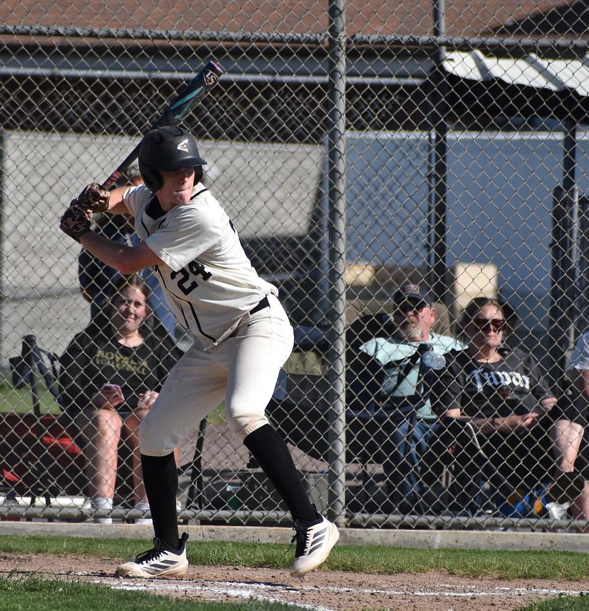 Knights player Bryan Larsen steps up to bat during the district game against Connell.