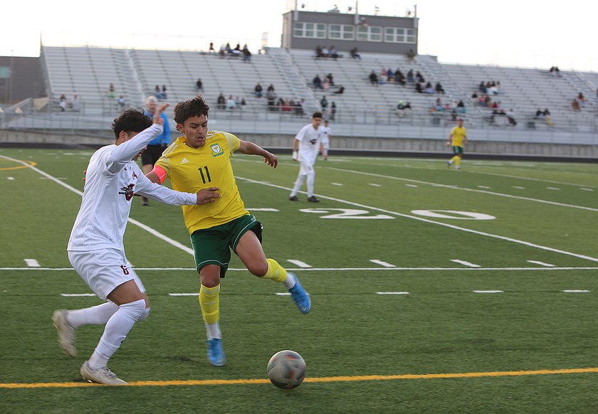 Erik Zepeda (11) battles with a Grandview defender during their first matchup earlier this season. The Jacks season came to an end after suffering a 2-1 loss in the district tournament to the Greyhounds.