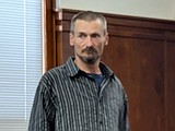 Ronan man accused of damaging house, car