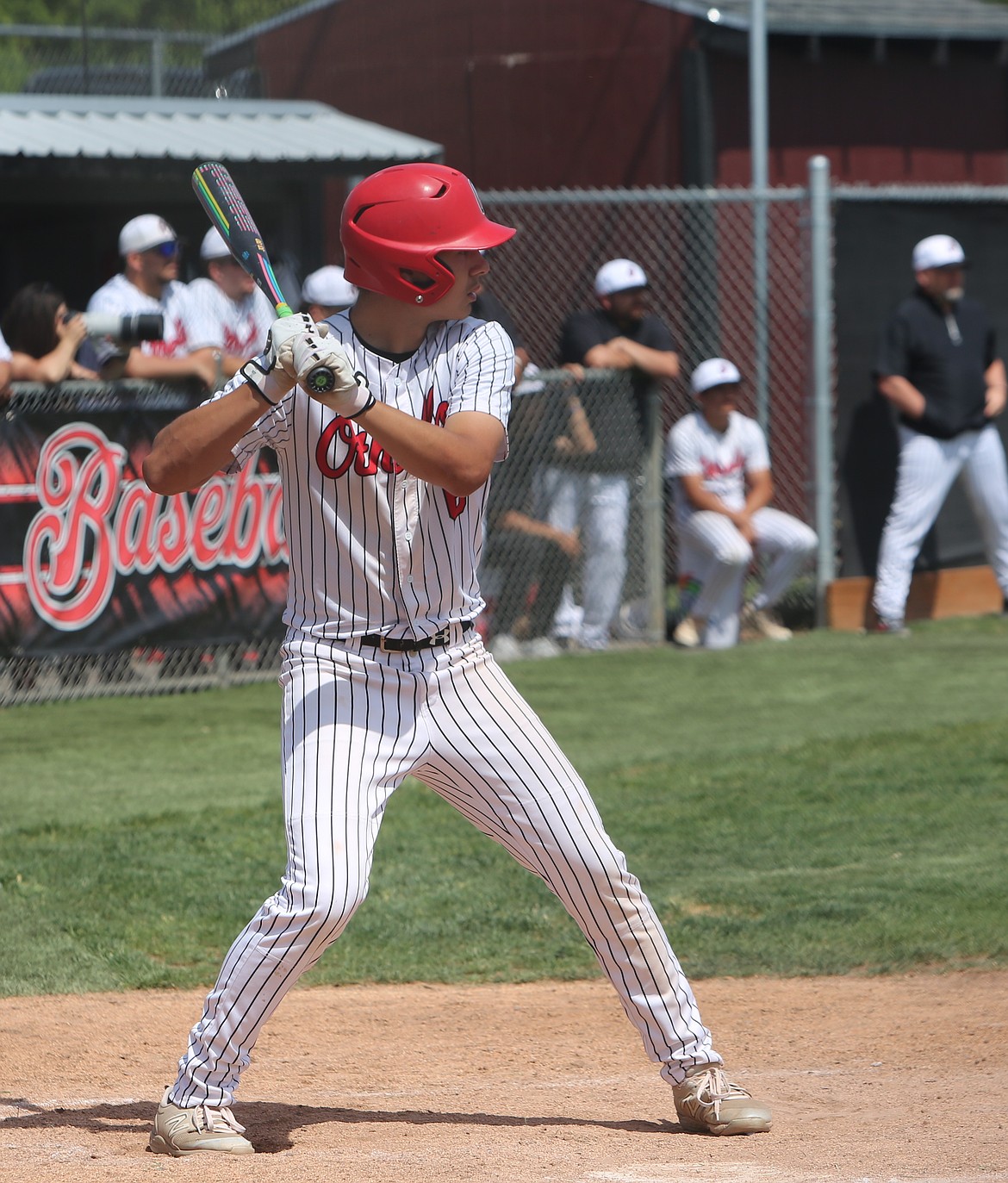 Trey Tovar (6) steps up to bat for the Othello Huskies during their district tournament game on Saturday.