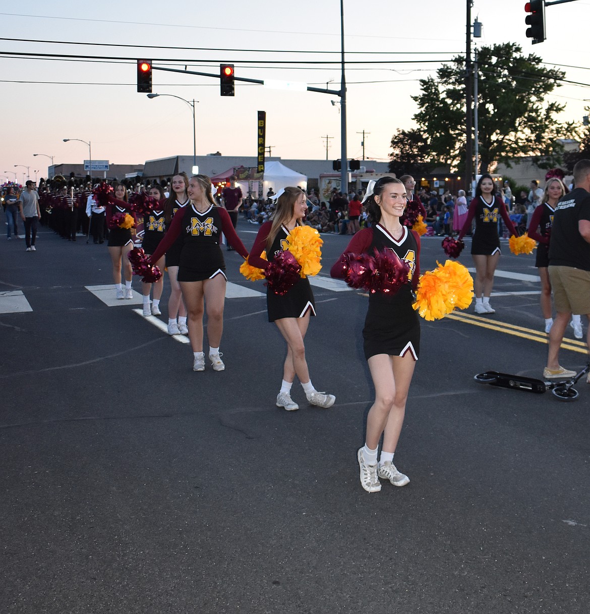 The Moses Lake High School cheerleaders march in the Moonlight Parade at last year’s Spring Fest.